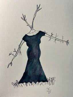 Un vestido oscuro del que salen ramas secas