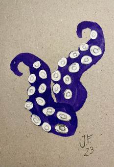 Un tentáculo morado con ventosas